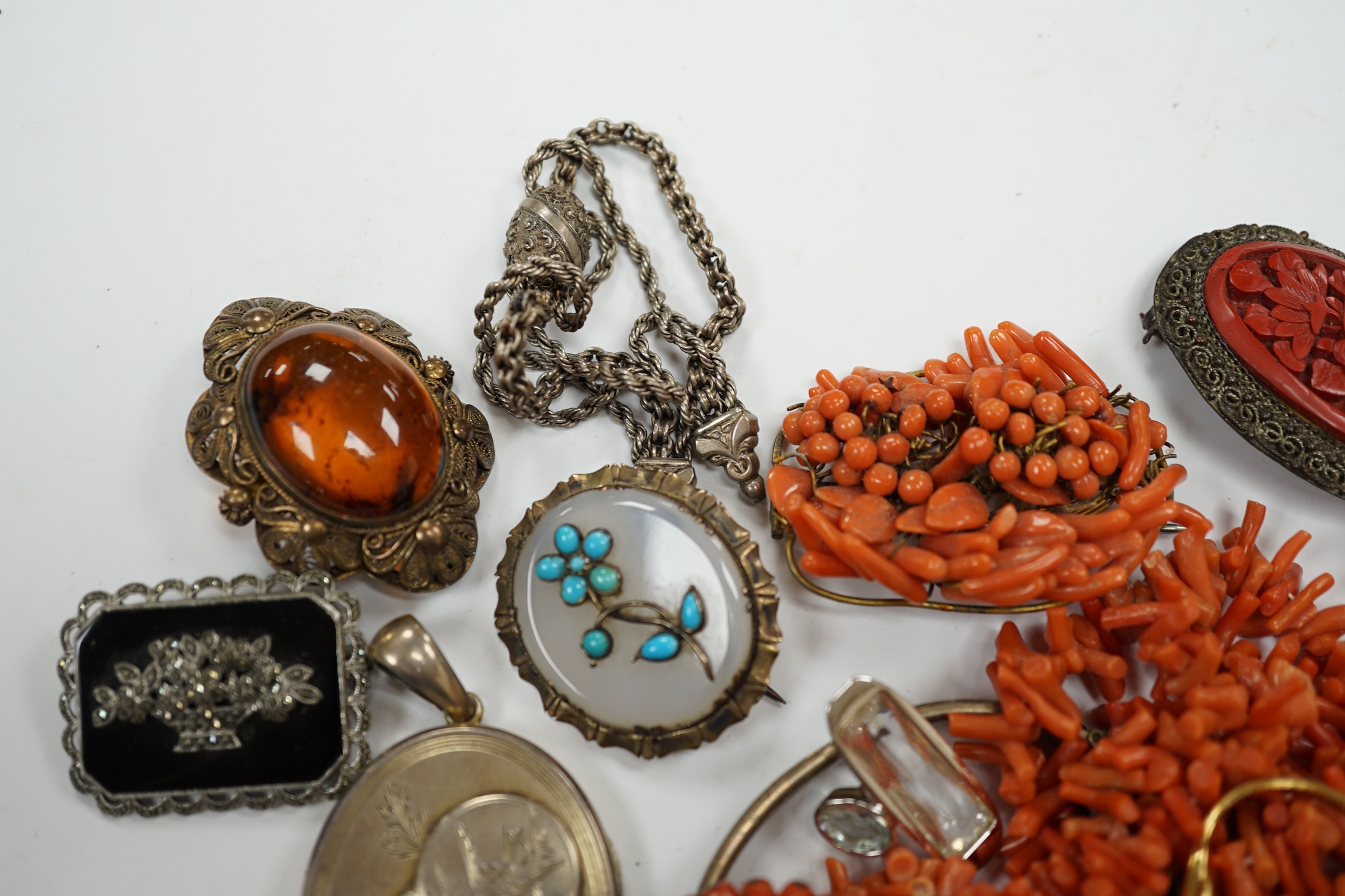 A group of assorted jewellery including costume, coral necklaces, chalcedony and turquoise set brooch, sterling bangle etc. Condition - poor to fair